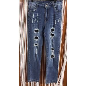 Y2K style jeans with rips and stitching